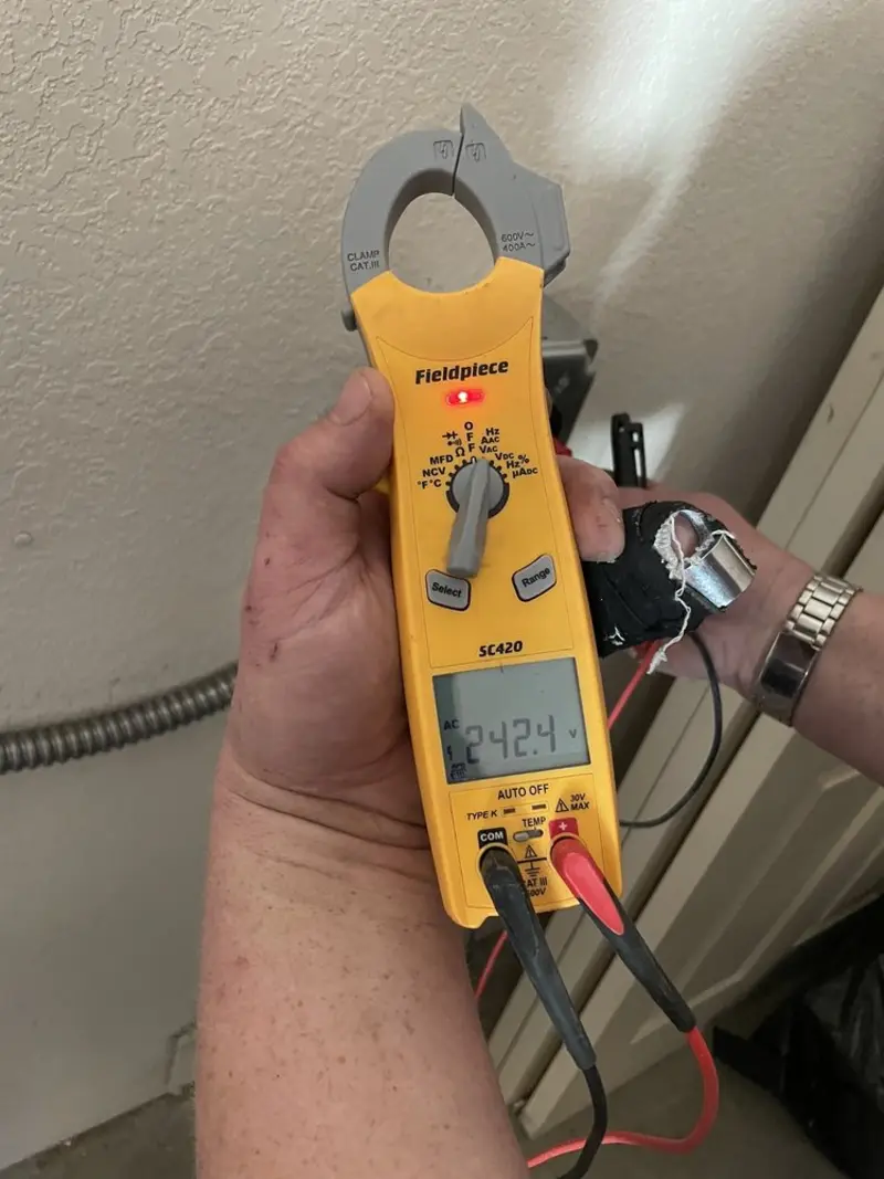 Voltage testing with clamp meter during Hot Tub / Pool Electrical Wiring in Mount Olive